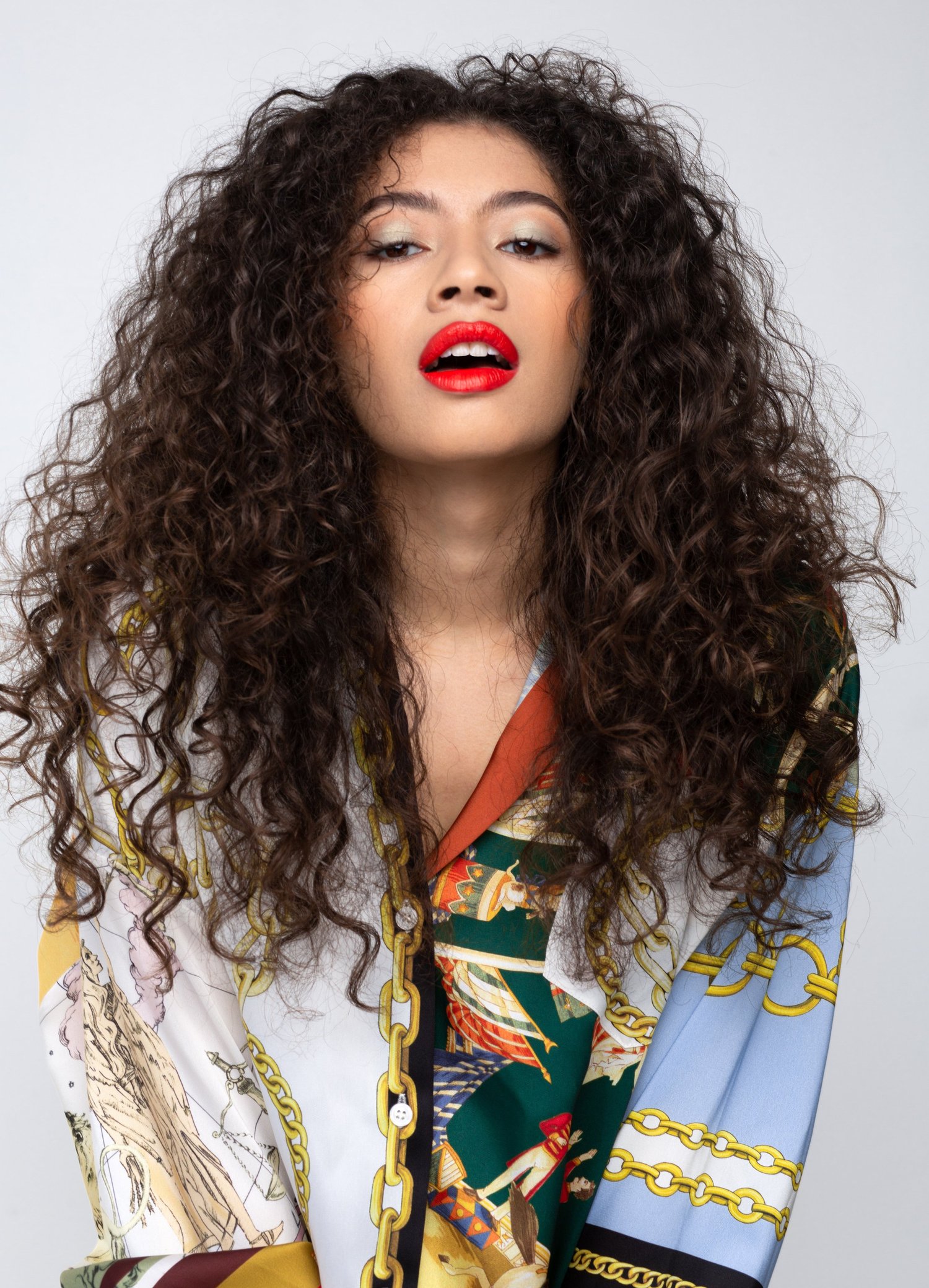 Beauty portrait, curly hair and scarf