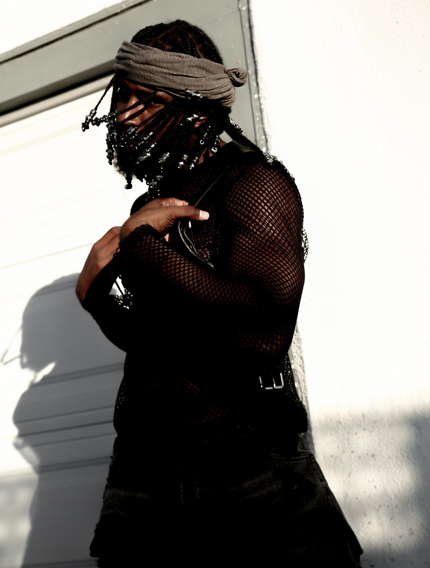 Editorial portrait in harsh sunlight